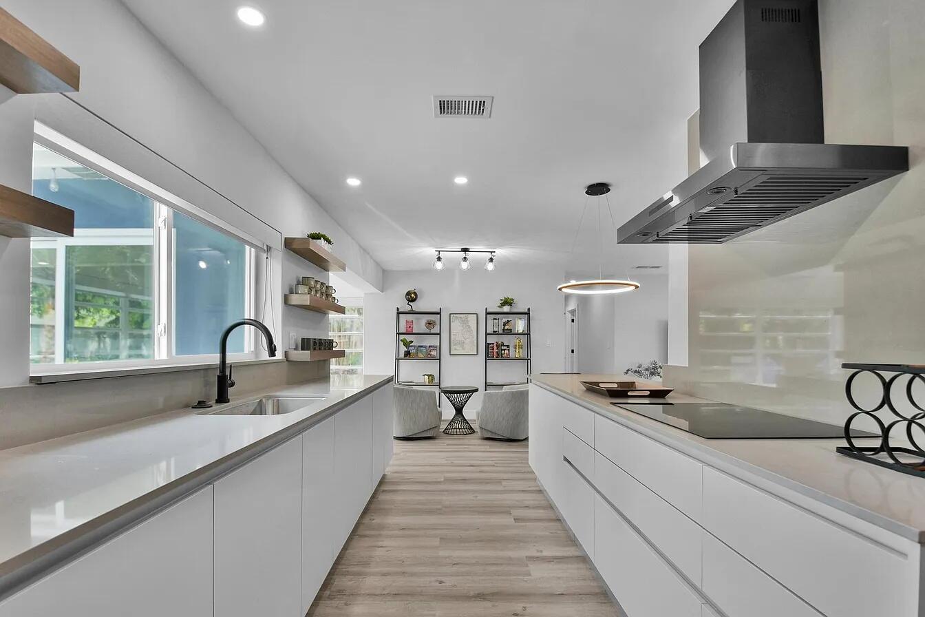 Welcome to this beautifully remodeled 4-bedroom, 2-bathroom single-family home that perfectly blends comfort, convenience, and value. Step inside to discover a thoughtfully updated interior, ideal for modern living.The expansive backyard is a standout feature--offering plenty of space to add a pool, host unforgettable gatherings, or simply relax and enjoy the peaceful surroundings.Nestled in the quiet, family-friendly community of Tropic Palms, this home is just minutes from I-95, Linton Boulevard, top-rated beaches, and a variety of shopping and dining destinations. Whether you're commuting, entertaining, or enjoying the Florida lifestyle, this location truly has it all.