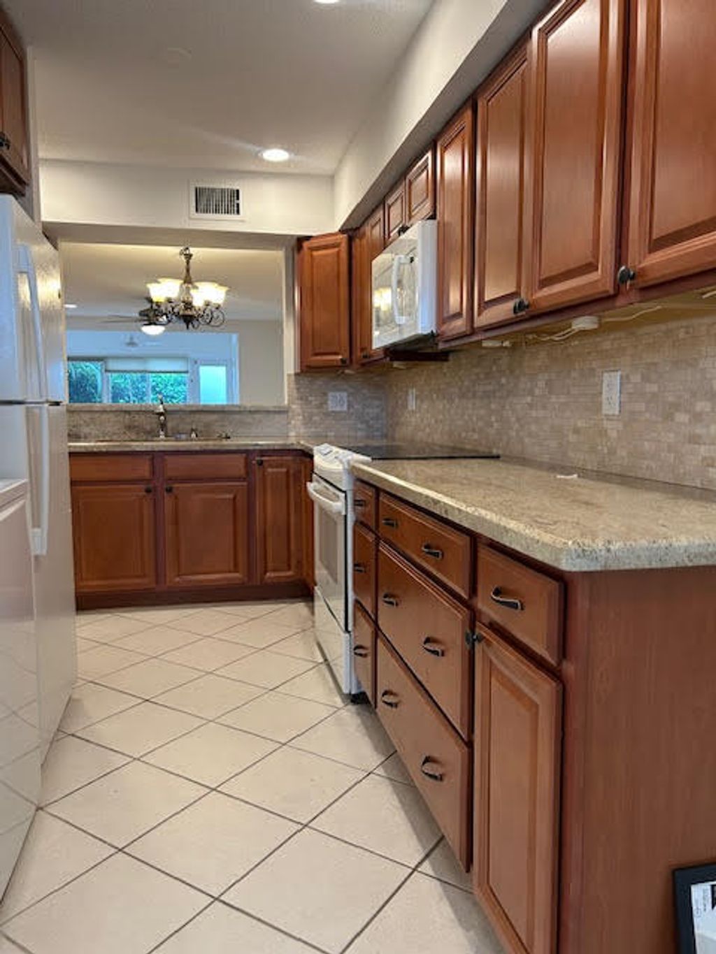 Photo of 13886 VÃ­a Flora A, Delray Beach, FL 33484 (MLS # B26013108)