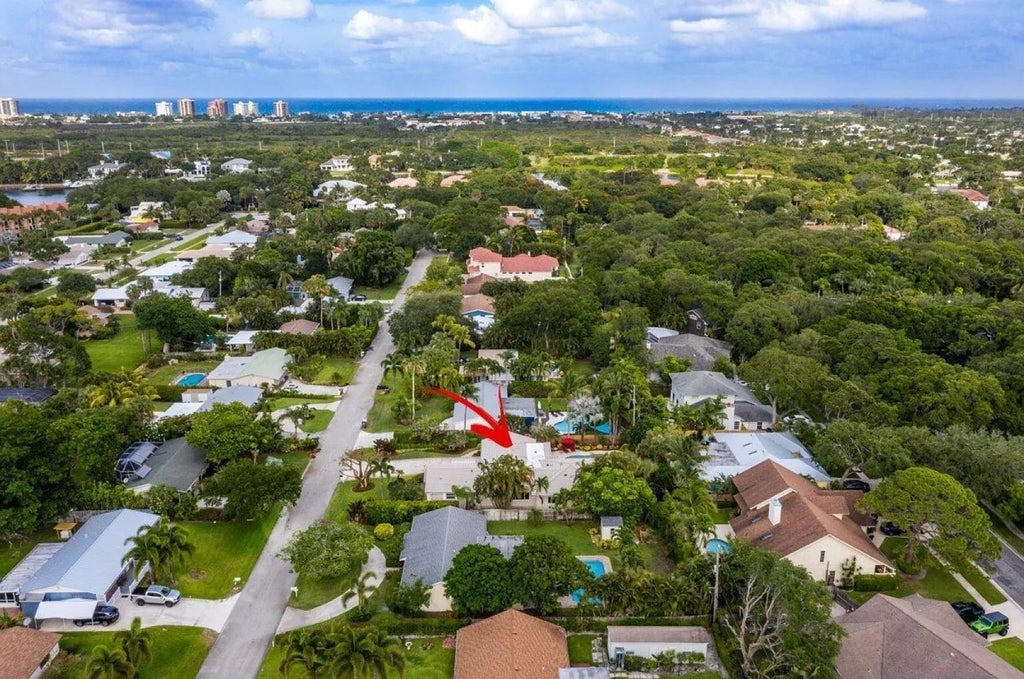 Photo of 2436 Holly Lane NE, Palm Beach Gardens, FL 33410 (MLS # B26037071)