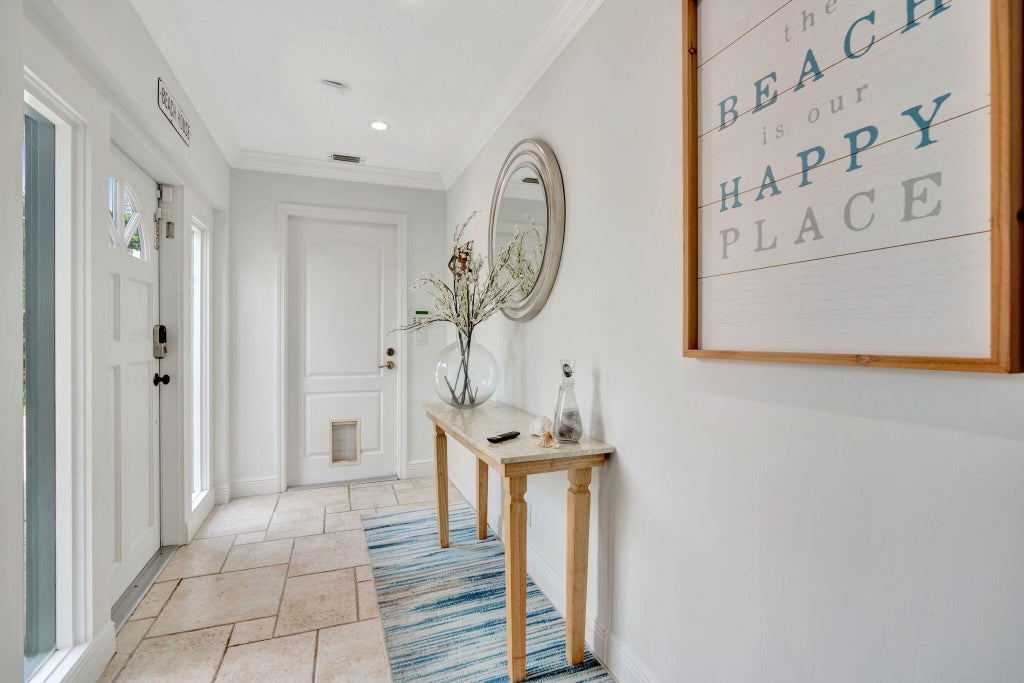 Photo of 2436 Holly Lane NE, Palm Beach Gardens, FL 33410 (MLS # B26037071)