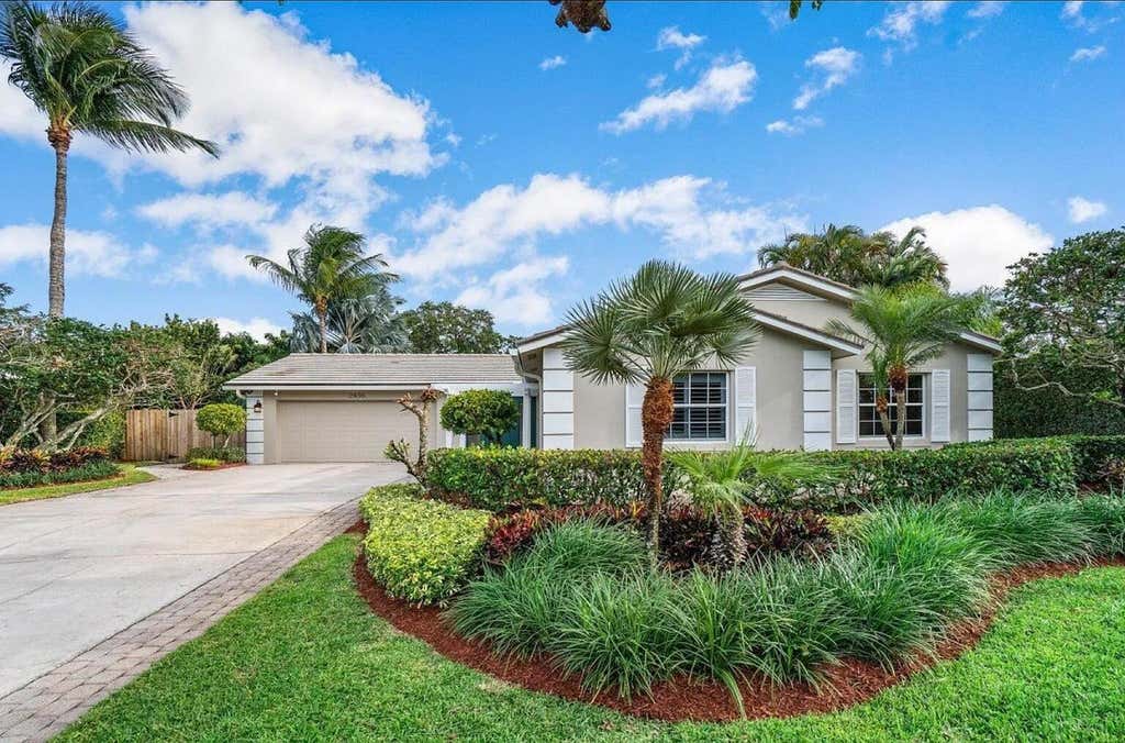 Photo of 2436 Holly Lane NE, Palm Beach Gardens, FL 33410 (MLS # B26037071)