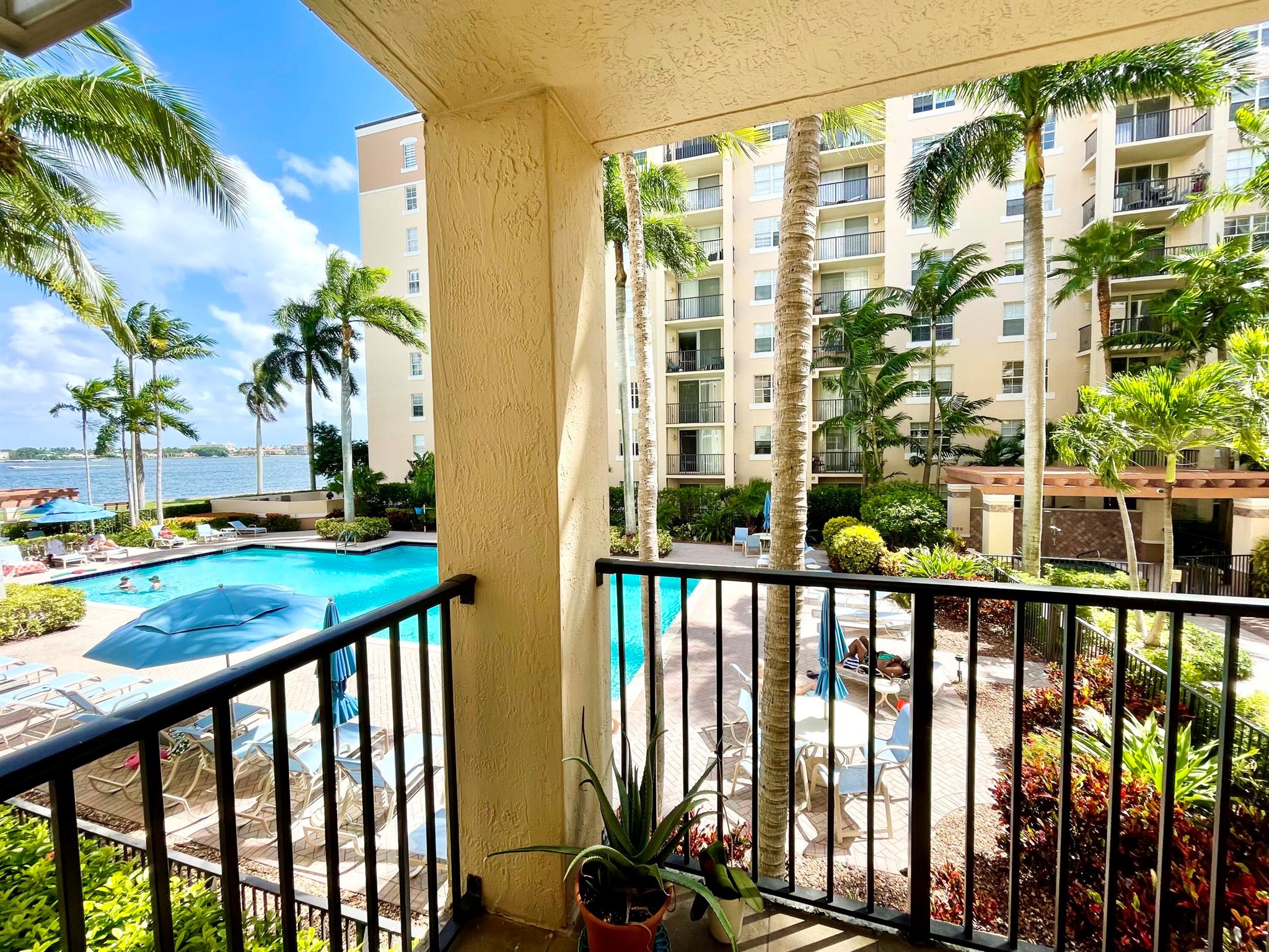 Enjoy Florida living at its best in this bright, fully furnished 2-bed/2-bath condo with pool and Intracoastal views in the desirable, gated luxury community of Flagler Pointe. The split-bedroom layout offers an open living and dining area, an updated kitchen with granite countertops, SS appliances, including a brand-new refrigerator, and in-unit washer and dryer. Relax on your private balcony overlooking the pool and Intracoastal or take advantage of resort-style amenities: heated pool and spa, fitness center, sauna, clubhouse, business center, billiards room, 24/7 concierge, secure garage parking, and storage for bikes. Internet included!