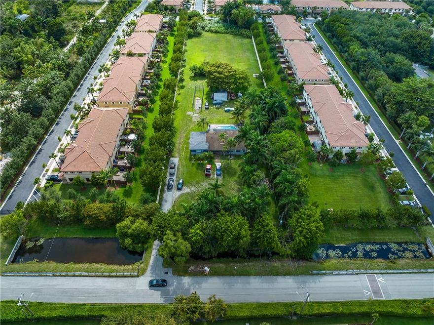 PRICE REDUCED!!DEVELOPMENT OPPORTUNITY!!! EXTREMELY PRIME LOCATION IN DAVIE. BUILD 10+ TOWNHOUSES or DREAM RANCH. Prime strip of land to build 10-15 units (2.24 acres). Townhouses in the area sell for $500k. Single family homes in the area sell for $800k. Prime location in west Davie close to 595. Potential Gross Income over $7.5M if the developer sells the units. Build and rent each unit starting at $2800 per month (based on area data), potential rental income $40k+ per month. Please note, a well maintained 2300 sq ft single family home with a pool also occupies the land. Potential buyer could buy it as a single family home with over 2 acres to build out a dream ranch. The parcel is currently zoned AG (Agricultural). Buyer will have to rezone and plot the land if building multiple units.
