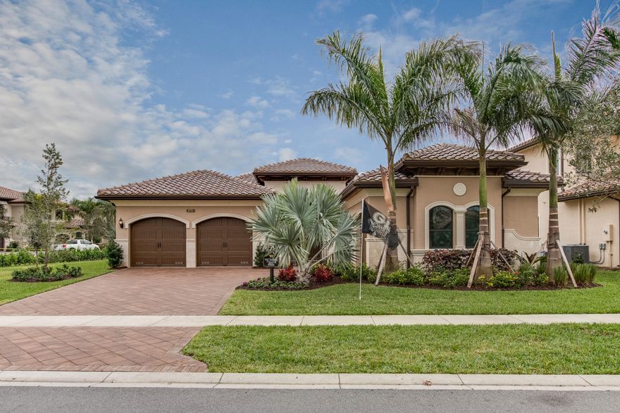 Stunning 4 bedroom, 3.5 baths, 3 car garage home. Great room with coffer ceiling and oversized sliders covered patio.  The upgraded gourmet kitchen is a chef's dream with 42' cabinets, upper and lower cabinet lighting,  granite counter tops, granite backsplash, stainless steel appliances, 36'' vented Wolf Chimney hood, 48'' Sub Zero refrigerator, double oven, center island, snack bar and family dining area. The luxurious master suite boasts a coffered ceiling, his and her walk in closets, dual sinks, Roman tub and a walk in shower. This home also boasts a formal dining room with a coffered ceiling,  24X 24 polished porcelain tile, impact glass, solid core interior doors, upgraded baths, and has been prewired for future pool-spa. The covered patio has a gas sub for a future summer kitchen.