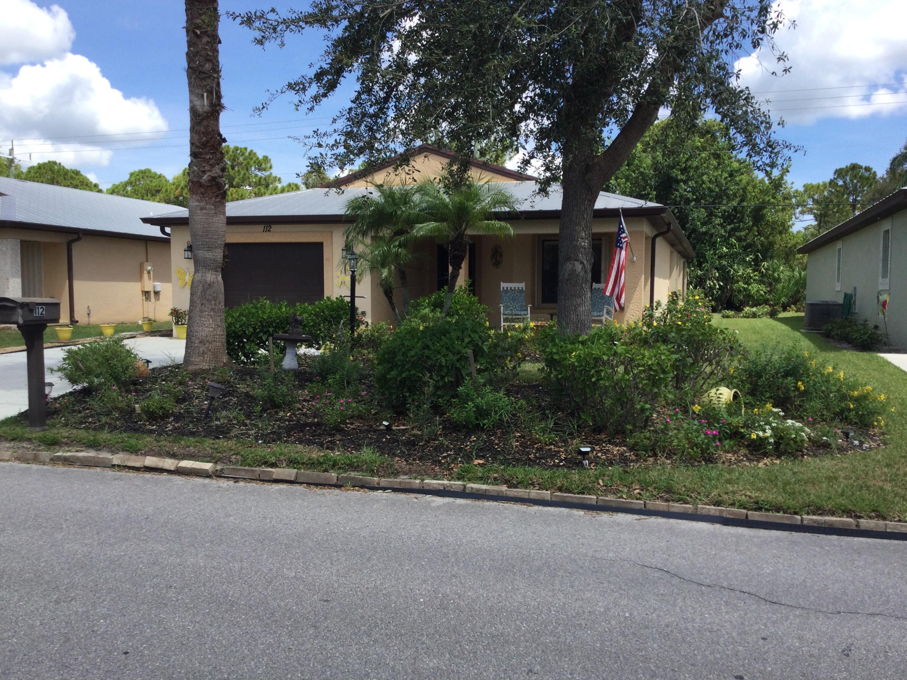 Beautiful CBC home backing to canal. Magnificent landscaping with private patio and Florida Room. This concrete block home features a new ac unit and hot water heater. Why wait for a new build when you can have this one for so much less.Lot rent covers all amenities, lawn care, trash removal and sewer. Amenities include golf, two pools (one heated), tennis, pickleball, bocce, ping pong, billiards, shuffleboard, clubhouse, card room, party room and much much more. Do as much as you like or just relax at the pool. Future residents must be approved by Spanish Lakes. Please call for application.