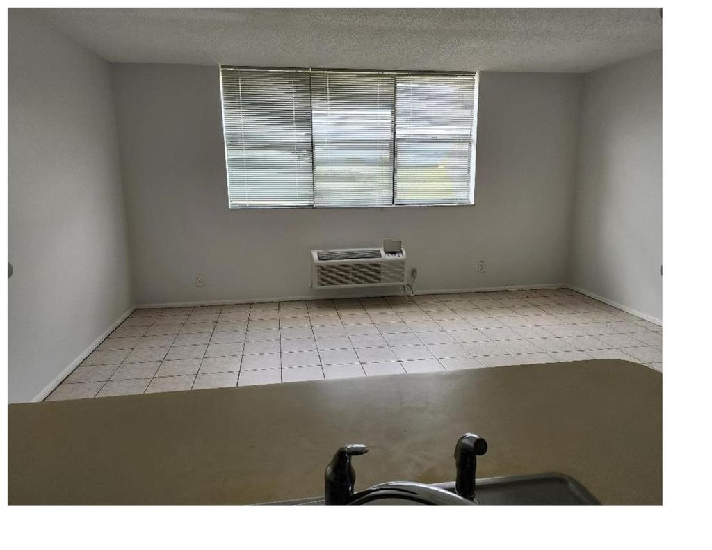 Photo of 2501 Riverside Drive #502-A, Coral Springs, FL 33065 (MLS # F10551220)