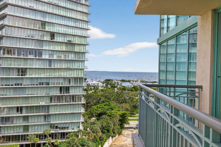 Fabulous 12th floor 1 bedroom 1.5 bath unit at the Ritz-Carlton Executive Residences in Coconut Grove. Great city and bay views from both terraces, living room and bedroom. Tiled floors throughout, open kitchen with granite countertops and stainless appliances. The spacious bedroom has a walk-in closet with built-ins. Primary bathroom has separate tub & shower and double sinks. Foyer entry has extra closets, half bath and washer & dryer. Enjoy luxury living with all the services and amenities that the Ritz offers.