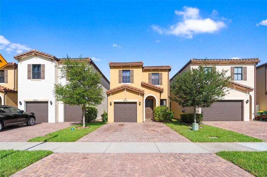 SINGLE-FAMILY in the sought-after Manor Parc built in 2019! This 3-bed, 2.5-bath home features ALL PGT impact windows & doors, BRICK paver driveway, tile roof, and a covered front porch. The open layout includes a spacious formal living area, formal dining room AND GREAT ROOM. The modern kitchen includes 36" ESPRESSO SOLID WOOD cabinetry, with island, stainless steel appliances & OPEN to great room. Enjoy PEACEFUL living with no rear neighbors, nearby guest parking & on a PRIVATE street. Community amenities include RESORT STYLE pool, cabana with restrooms, BBQ area, playgrounds, and scenic walking paths. Prime location near Turnpike, I-95, Sawgrass Mills, dining, and beaches.