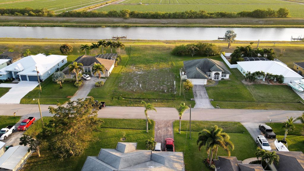 Photo of 411 SW Kestor Drive, Port Saint Lucie, FL 34953 (MLS # R10865238)