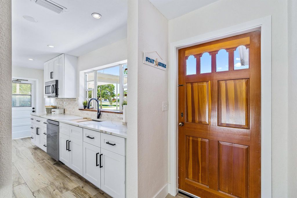 Photo of 805 Alamanda Drive, North Palm Beach, FL 33408 (MLS # R10929089)