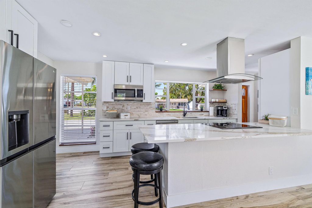 Photo of 805 Alamanda Drive, North Palm Beach, FL 33408 (MLS # R10929089)