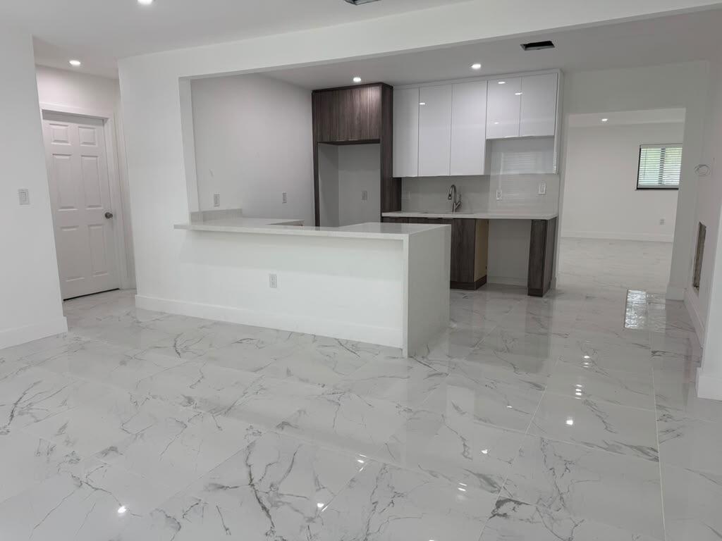 Photo of 1031 NW 10TH Avenue, Fort Lauderdale, FL 33311 (MLS # B26084522)