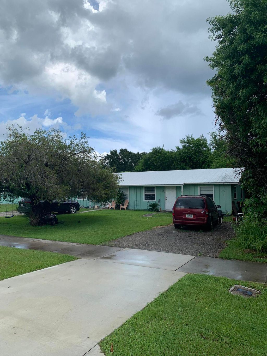 Photo of 2993 SE Camino Avenue, Stuart, FL 34997 (MLS # R10908594)