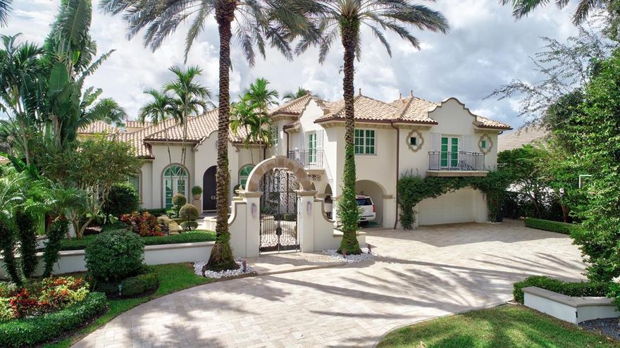 Mediterranean charm with South Beach flair & the best lake & golf course views in Woodfield Country Club! A stone pavered driveway, wrought iron gate & front entry courtyard with a fountain lead up to this magnificent estate of exterior old world charm of 7BD + office & 7.5 BA. When you open the front doors, the feeling of contemporary decor fills your senses. Detailed to the nines offering state-of-the-art technology & fine finishes, this estate was renovated & updated. This newly refurbished estate offers volume ceilings, white high-gloss island kitchen w/stainless appliances, dark & whitewashed wood floors & an exquisite patio w/lake & golf views,  summer kitchen, pool,spa + more! The main home offers  4 bedrooms + a loft & office. The two-story guesthouse offers 3 bedrooms & 2 baths.