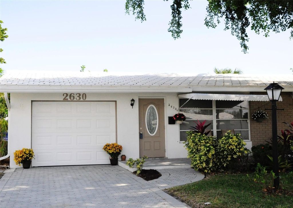 Photo of 2630 E Golf Boulevard, Pompano Beach, FL 33064 (MLS # F10537612)