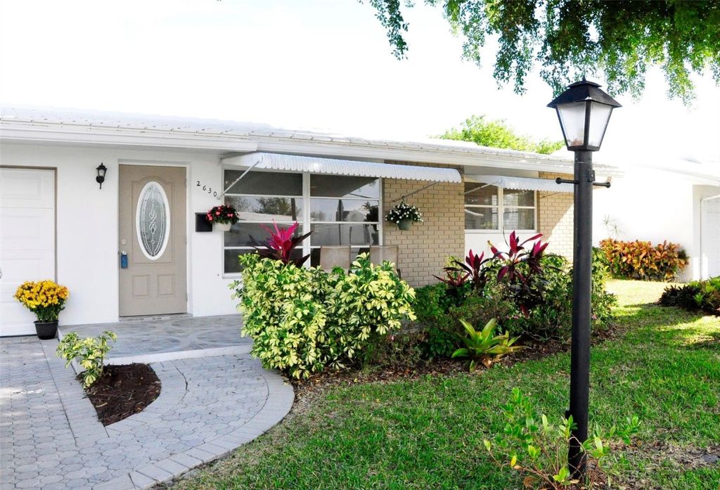 Photo of 2630 E Golf Boulevard, Pompano Beach, FL 33064 (MLS # F10537612)