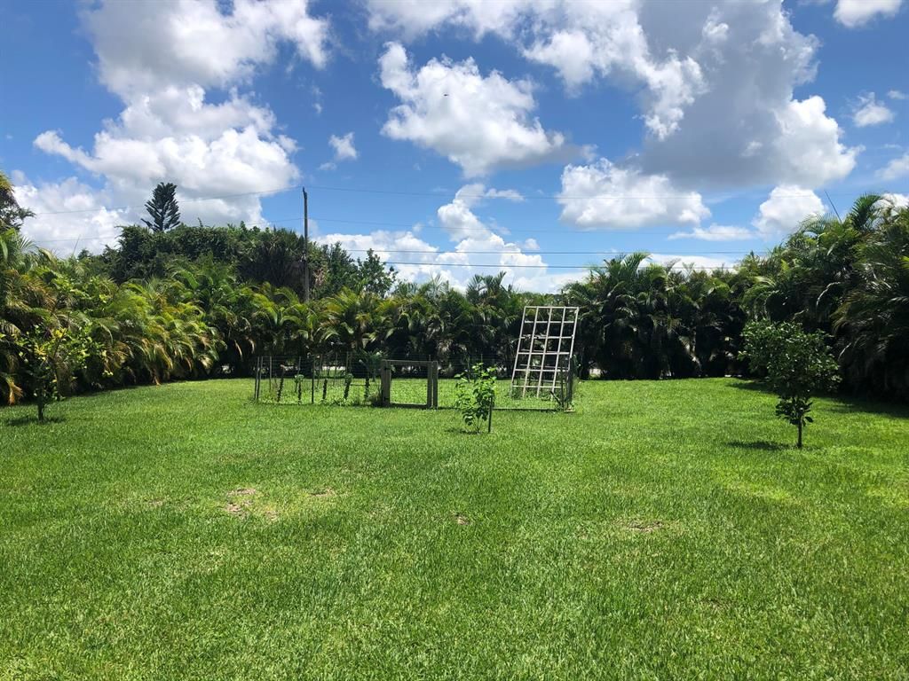 Photo of 1649 SW Merchant Lane, Port Saint Lucie, FL 34953 (MLS # R10734600)