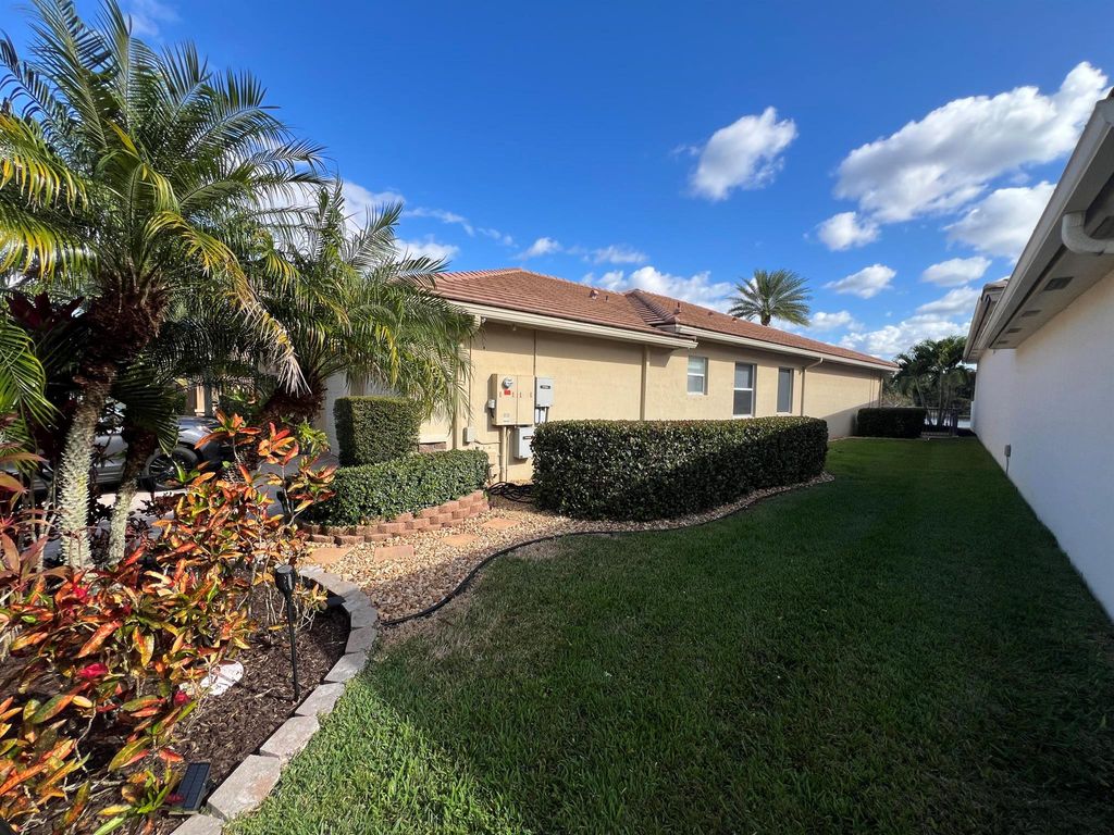 Photo of 9534 Osprey Isles Boulevard, Palm Beach Gardens, FL 33412 (MLS # R11149807)