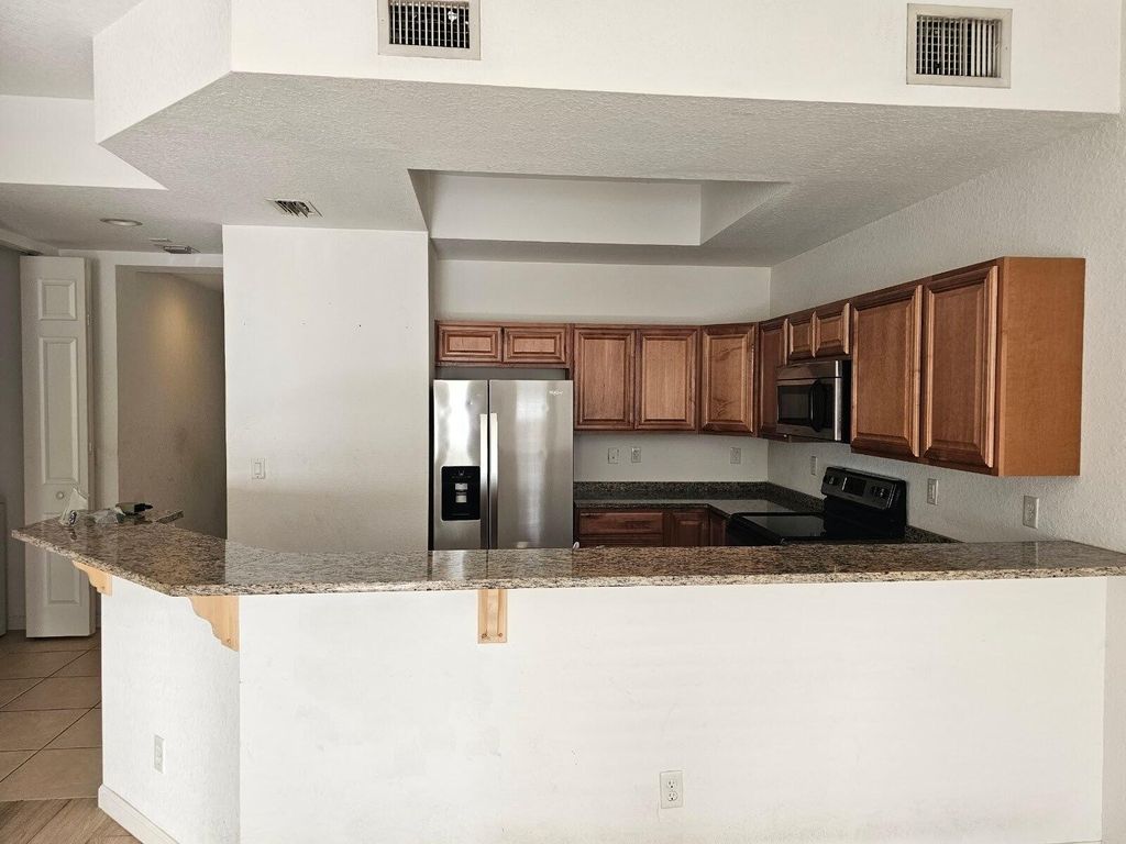 Photo of 10440 SW Stephanie Way #4204, Port Saint Lucie, FL 34987 (MLS # R11116319)