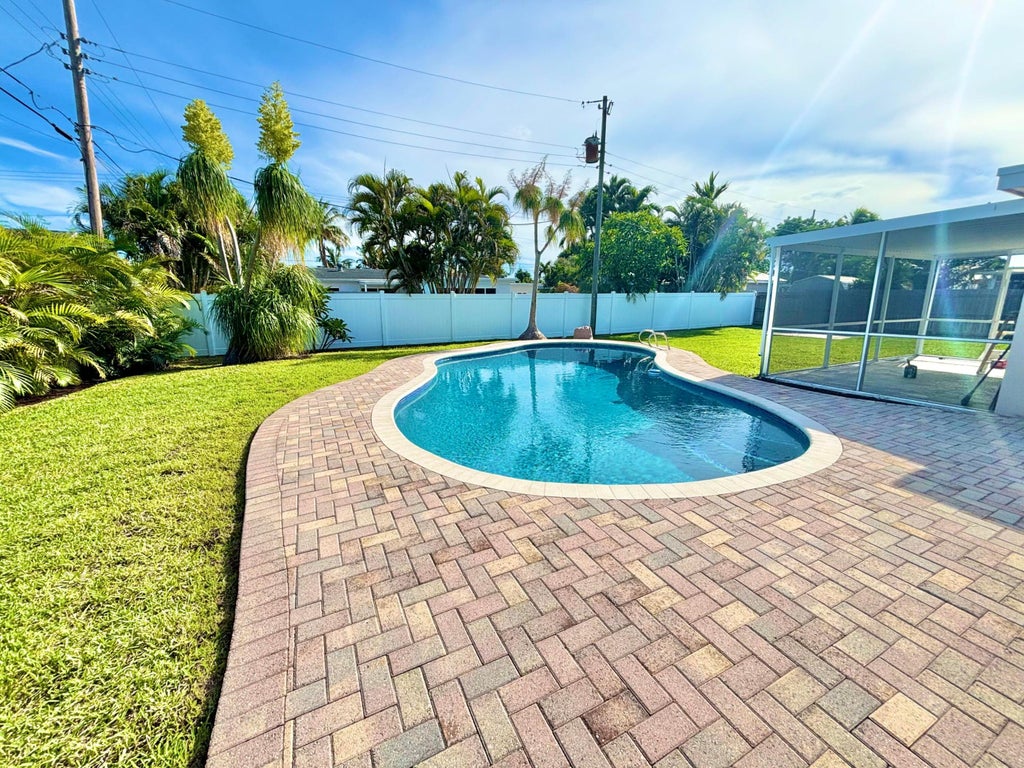 Photo of 470 NE 45TH Street, Boca Raton, FL 33431 (MLS # B26074481)