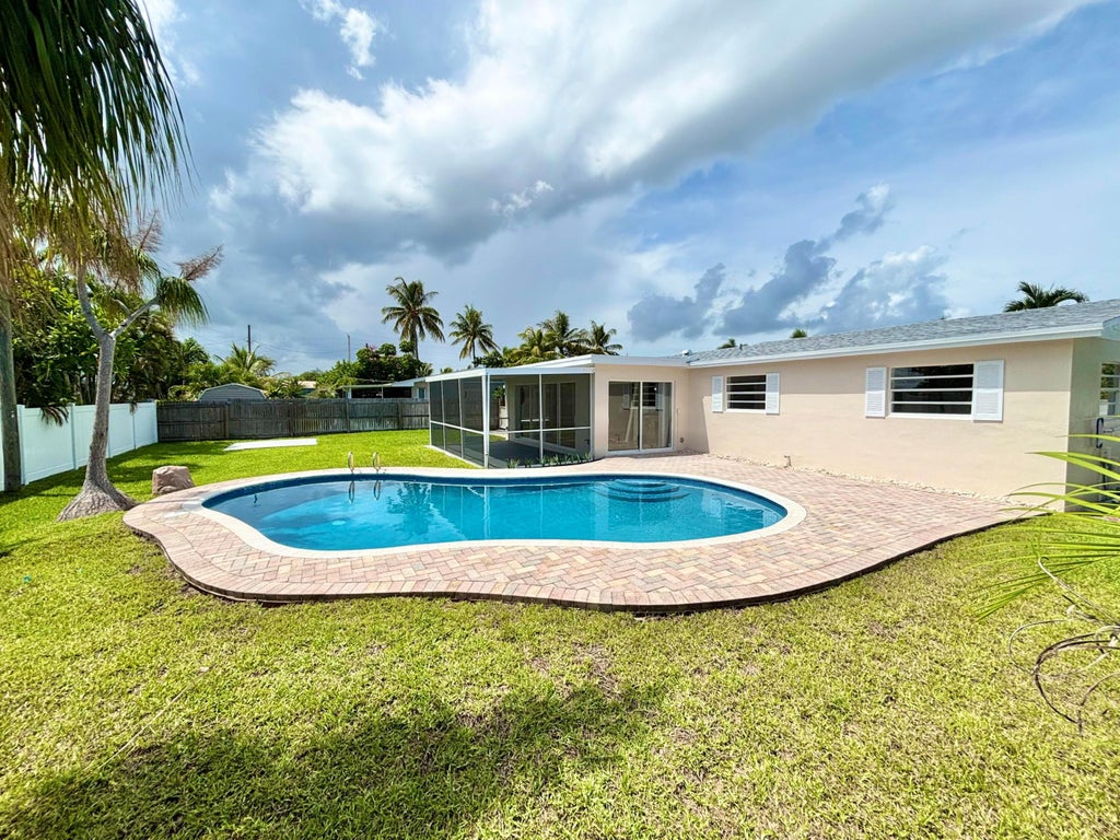 Photo of 470 NE 45TH Street, Boca Raton, FL 33431 (MLS # B26074481)