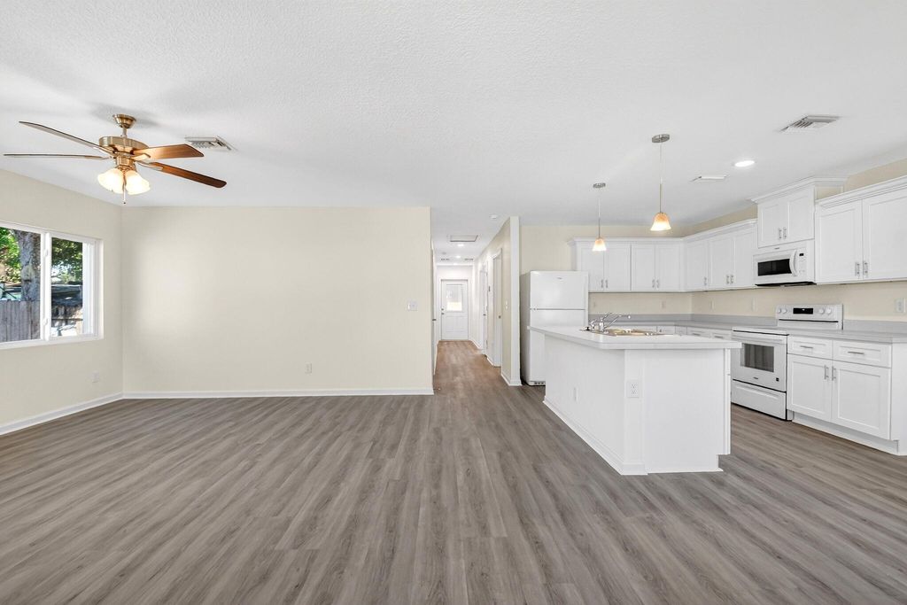 Photo of 857 W 3rd Street, Riviera Beach, FL 33404 (MLS # R11149263)