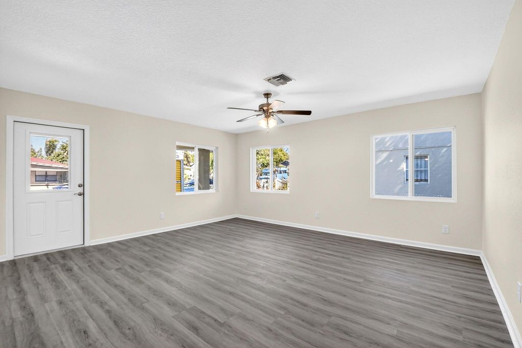 Photo of 857 W 3rd Street, Riviera Beach, FL 33404 (MLS # R11149263)