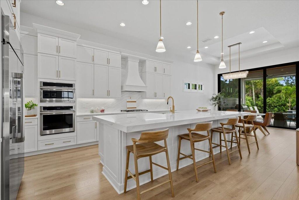 Photo of 13234 Artisan Circle, Palm Beach Gardens, FL 33418 (MLS # B26018115)