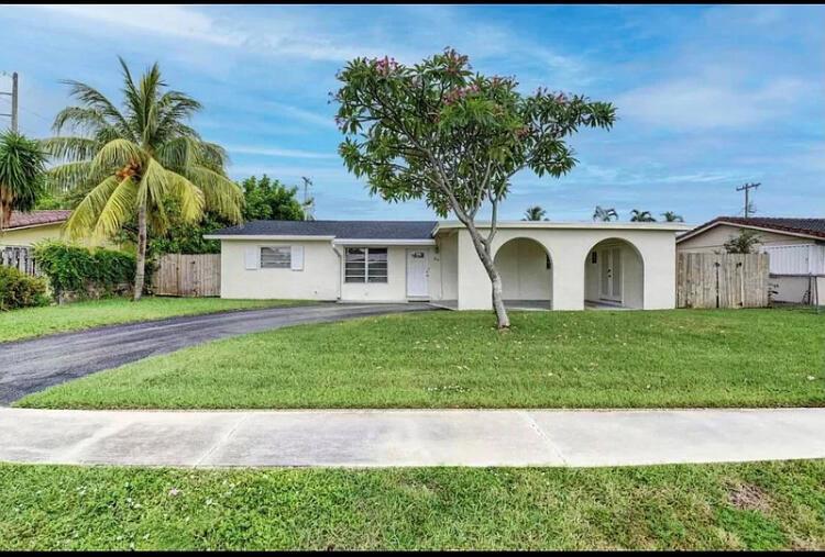 Location, Location, Location. Very clean 4 bedroom home located walking distance from downtown and a short bike ride to the beach. Close to Mizner and all your favorite shopping and restaurants. Large fenced in backyard with a carport and exterior impact glass windows installed recently. Popular southeast exposure and good sized cover patio. Newer roof and A/C.