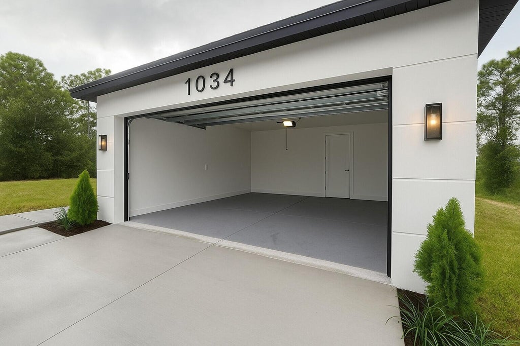 Photo of 1034 E Alcalde St Street E, Lehigh Acres, FL 33974 (MLS # B26021349)