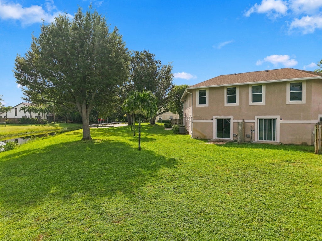 Photo of 1031 Goldenrod Road, Wellington, FL 33414 (MLS # B26079963)