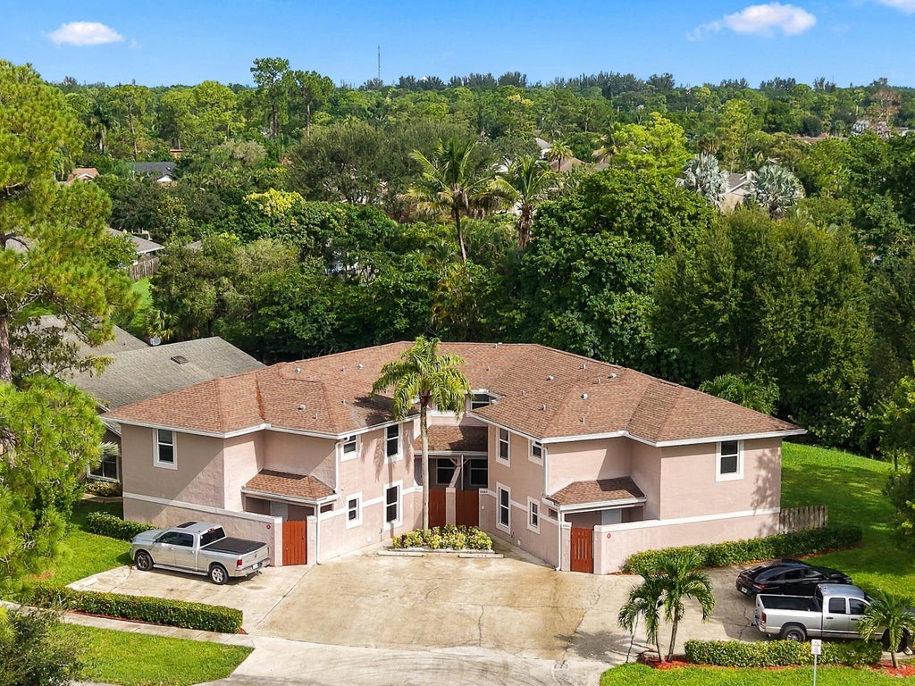Photo of 1031 Goldenrod Road, Wellington, FL 33414 (MLS # B26079963)