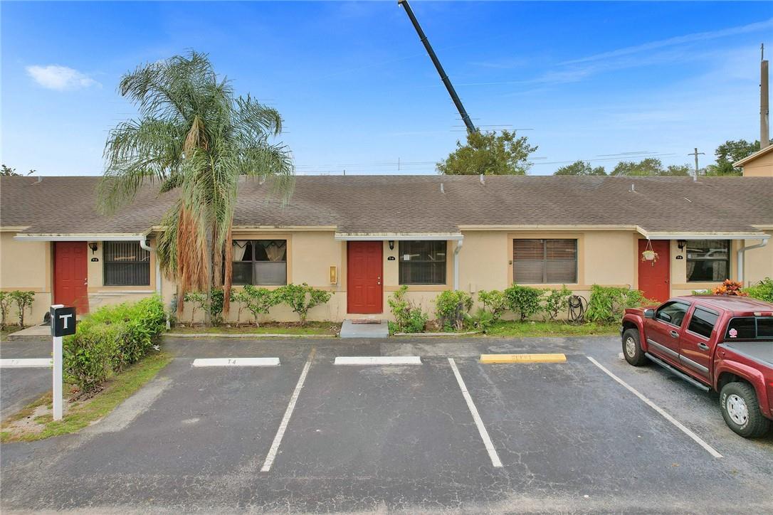 Village At Blue Lake. Don't miss out on this rare opportunity to own a 2 bedroom/2 bathroom villa style condominium in Pompano Beach. Approximately 1200 square feet of living space with large bedrooms, a decent size living dining area, a newer kitchen, screened in patio and washer and dryer in the unit. Also, there are two assigned parking spots with additional guest parking. Community features an exercise room, tennis courts, clubhouse with restrooms and a large pool and sun deck. Conveniently located east of Powerline right off of Sample Road. Easy access to I-95, Costco and plenty of restaurants and shopping. With a little TLC this will make a great home. Priced to sell.