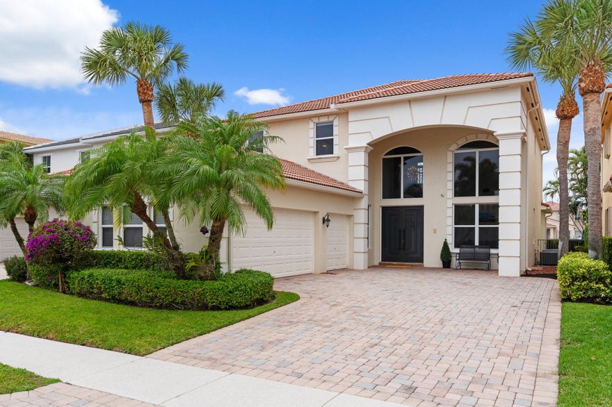 MOTIVATED SELLER. Amazing opportunity to own the popular Ibiza model that features FIVE bedrooms, including the option to have your primary bedroom upstairs or down. Perfectly maintained, ALL IMPACT windows and doors. This home sits on the canal with great views from the family and kitchen area. Three car garage with EV charger in place. Backyard pavers recently redone. Room for a custom pool or enjoy the gorgeous pool at the clubhouse, along with tennis courts, resort-like gym, events and more. Mirabella is walking distance to desirable Marsh Pointe Elementary and minutes from everywhere you would want to be: beach, airport, restaurants, Alton Town Center and more.