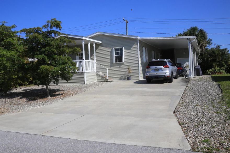 Great home for Investor, first time homebuyer or Senior in this well maintained, clean, Furnished Turnkey, low maintenance home with everything you need! 3 bedrooms, 2 baths, extra tall Carport, extra parking and Golf Cart Garage. This 2018 Jacobsen home offers volume 9' ceilings, custom kitchen and baths, wired for whole house generator, Accordion Shutters on all windows, extra-large lanai and covered front porch.  Relax in the large Main Bedroom with luxury Main Bathroom.  Kitchen is perfect for entertaining with a center Island and open Living area.  Ridgeway is centrally located and close to Beaches, shopping and restaurants. All ages and pets welcome and No HOA Fee! Trucks/RVs permitted.
 Refrigerator Water/Ice not hooked up. Portable Generator never used but not warranted by Seller