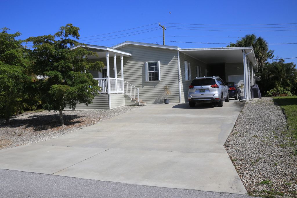 Photo of 7146 SE Bluebird Circle, Hobe Sound, FL 33455 (MLS # R10985295)