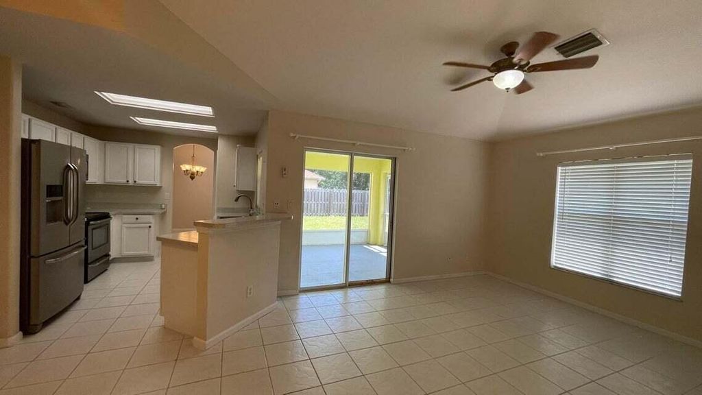Photo of 1911 SE Camilo Street, Port Saint Lucie, FL 34952 (MLS # R10976099)
