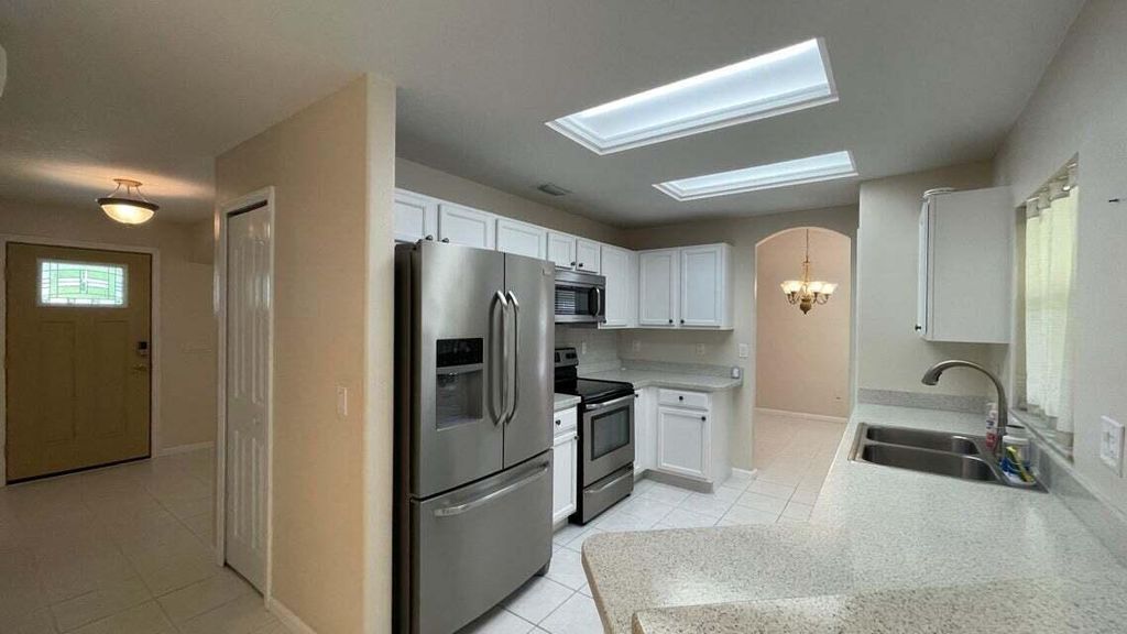 Photo of 1911 SE Camilo Street, Port Saint Lucie, FL 34952 (MLS # R10976099)