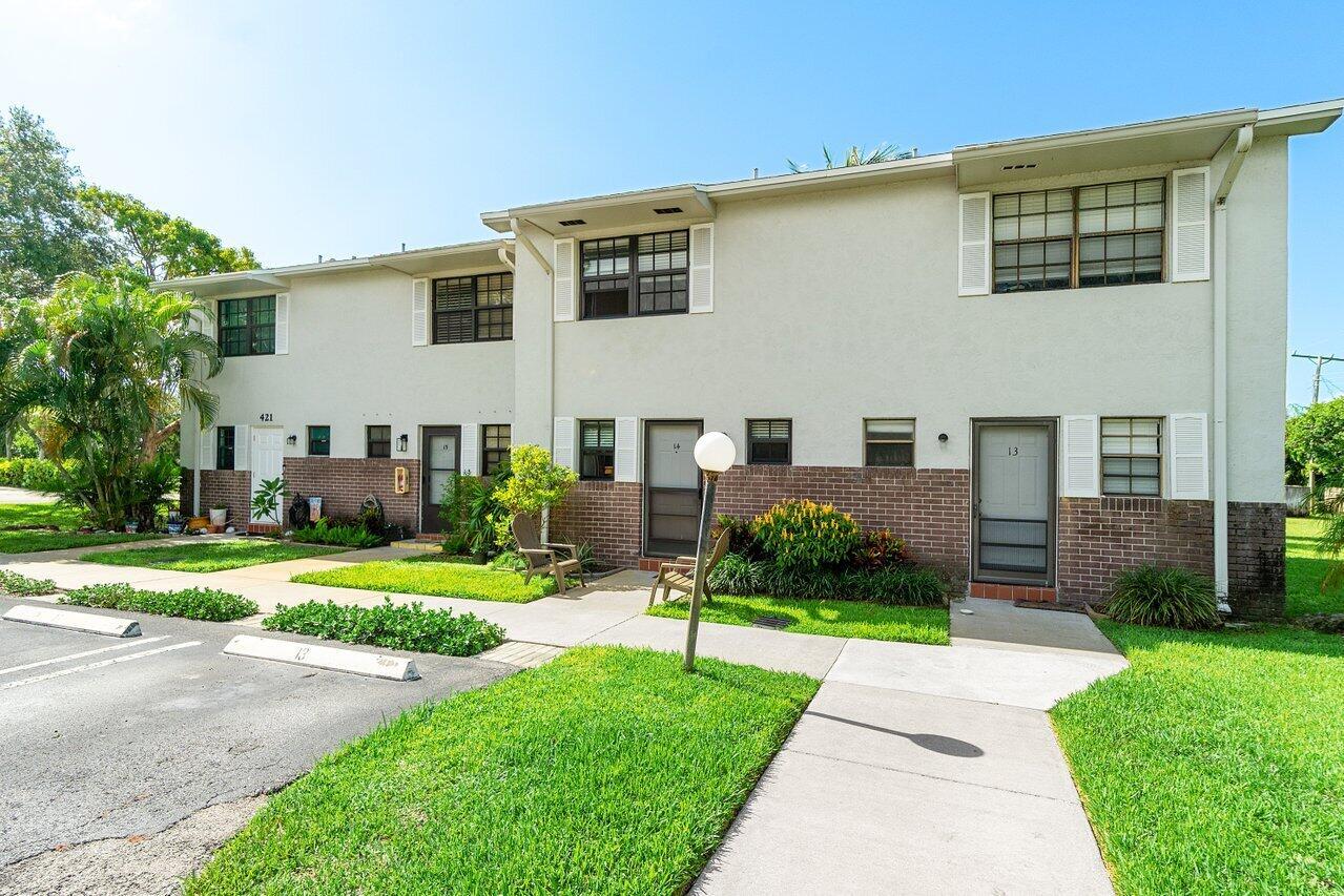 Charming Renovated Townhome in the Heart of Tequesta! This beautifully updated 2-story townhome offers 2 bedrooms and 1.5 baths, featuring wood flooring and crown molding for a polished touch. The galley-style kitchen boasts white cabinetry, a decorative tile backsplash, and connects to a cozy dining area and spacious living room that opens to a large, private fenced patio--perfect for entertaining. Upstairs, you'll find two generously sized bedrooms and a convenient utility closet with a washer and dryer. Additional highlights include impact windows, ample storage, and two assigned parking spaces. Located just minutes from sandy white beaches, fine dining, and boutique shopping, this home offers comfort, style, and an unbeatable location.