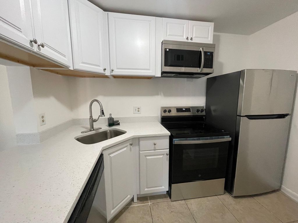 Photo of 812 Sky Pine Way #D1, Greenacres, FL 33415 (MLS # R11137768)