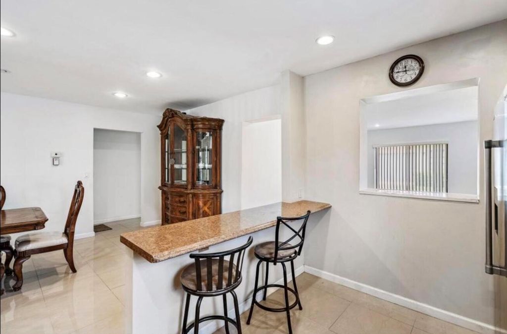 Photo of 6089 Glentree Lane, Greenacres, FL 33463 (MLS # R11147696)