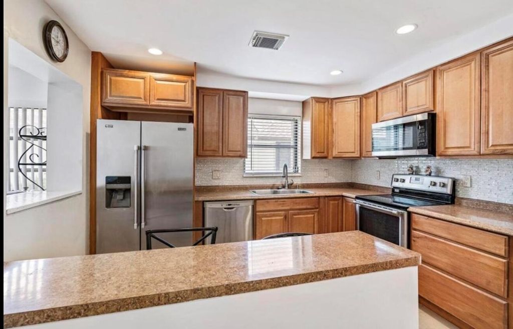 Photo of 6089 Glentree Lane, Greenacres, FL 33463 (MLS # R11147696)