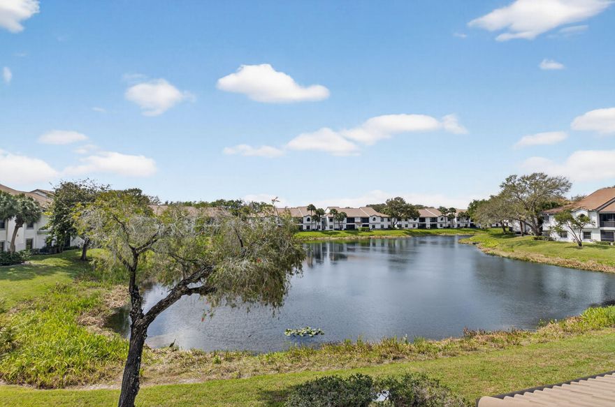 Wake up to sparkling lake views in this bright and beautifully maintained second-floor condo offering 3 bedrooms and 2 bathrooms. Laminate flooring flows throughout, and the split bedroom floor plan provides both comfort and privacy. Vaulted ceilings enhance the open, airy living space and fill the home with natural light. The kitchen is thoughtfully designed with stainless-steel appliances, granite countertops, and a granite backsplash, creating a functional space for everyday living and entertaining. The updated primary bathroom features dual sinks and a frameless walk-in glass shower, while the second bathroom has also been tastefully updated. Mirrored closets are featured in all three bedrooms, and double doors open to the third bedroom, making it ideal as a den, home office, or guest room. Unwind on the glass-enclosed balcony overlooking the tranquil lake. It is the perfect place to enjoy morning coffee or evening relaxation while taking in the peaceful water views. Sold furnished with the contents currently in the unit (the table on the balcony is virtual). This home offers a convenient, move-in ready opportunity. Lovingly maintained and ready for its next owner, this home is not to be missed.

Platina offers care-free, resort-style living at its very best! AT&T FIBER OPTIC HIGH SPEED INTERNET is INCLUDED IN THE CONDO FEES along with DIRECT TV, PEST CONTROL, ROOF MAINTENANCE and WATER. All you pay for is electricity! The active 20,000 square foot clubhouse will be renovated beginning in May. Cafe open for breakfast and lunch and offering take-out meals, card rooms, fitness center with stationary bicycles in a solarium overlooking the pool area. Relax in one of the satellite pools or at the enormous free-form main pool and spacious sundeck. Tennis, handball and pickleball courts. There is also an art room with a kiln! With shows, bingo, and an array of clubs, you will not be bored! 24-hour guard gated community. Convenient access to I-95 and the Florida Turnpike. Close to shopping and wonderful restaurants