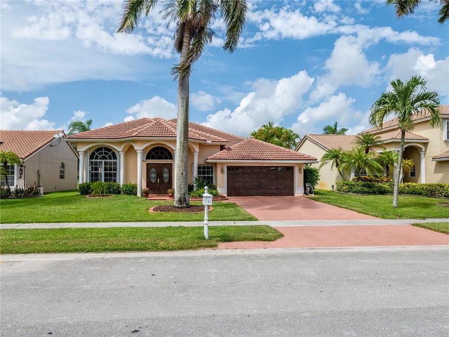 DISTANCE VIEWS OF LAKE & SCREENED SALT WATER HEATED POOL W/6 JACUZZI JETS SHOWCASE THIS UPDATED ONE STORY HOME W/OPEN KITCHEN, MARBLE COUNTERS/PORCELAIN TILE BACKSPLASH/SS APPLIANCES/WHITE CABINETRY/SEPARATE PANTRY. VOLUME CEILINGS GLANCE OVER FORMAL DR/SEPARATE LR & GREAT RM. RICH ENGINEERED WOOD FLOORS; TILE FLOORS IN BATHS. GUEST BATH W/TUB & SHOWER & MARBLE COUNTERS DOUBLES AS CABANA BATH. LARGE MASTER SUITE W/FRENCH DOORS/LARGE WALK-IN CLOSETS/ENSUITE BATH W/SEAMLESS SHOWER DOORS/WHIRLPOOL TUB/MARBLE COUNTERS/DOUBLE SINKS W/FOUNTAIN FAUCETS/VANITY & SEPARATE COMMODE RM. SEPARATE LAUNDRY RM; BRAND NEW AC; 24 HR GUARD GATED COMMUNITY W/TENNIS/FITNESS/POOL/TOT LOT. BLAST INTERNET & CABLE INCLUDED IN HOA FEE. NEAR SHOPS/DINING+ADJACENT TO SOUTH COUNTY PARK W/GOLF COURSE/WATER PARK. BRAND NEW AC INSTALLED IN 2021 WITH 12 YEAR WARRANTY;SALT WATER HEATED POOL WITH 6 JACUZZI JETS; THERE IS A WATER HEATER ON RIGHT WITH POOL FILTER;WATER FILTRATION SYSTEM ON LEFT SIDE OF HOME HAS NOT BEEN USED BY THIS SELLER SO IT MAY NEED SERVICING & FILTER CHANGE;SELLER IS LEAVING GRAY STOOLS CURRENTLY IN KITCHEN.CENTRAL VAC THROUGHOUT HOME;FRONT LOAD WASHER & DRYER ARE 3 YEARS OF AGE.NEW ROOF INSTALLED IN 2007 PER PREVIOUS LISTINGS OF THIS HOME;COMPUTERIZED SPRINKLER SYSTEM ALL AROUND PROPERTY USES FREE LAKE WATER;NEW SPRINGS ON GARAGE DOOR INSTALLED ON 12/21/21.RECESSED LIGHTING IN KITCHEN AND HALLWAYSMODERN FAN LIGHTING IN KITCHEN AND BEDROOMSSEPARATE LAUNDRY ROOMCONCRETE GARAGE FLOORSFOR HURRICANE PROTECTION: ACCORDION SHUTTERS AVAILABLE FOR EVERY WINDOW & DOOR EXCEPT GARAGE DOOR AND ENTRY DOORS HAVE PANELS.