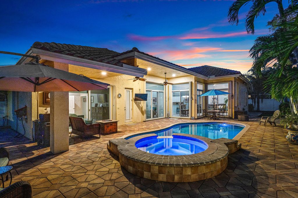 Photo of 9696 Plumeria Way, Boynton Beach, FL 33436 (MLS # B26004400)