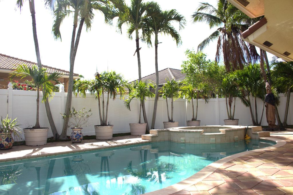 Photo of 9696 Plumeria Way, Boynton Beach, FL 33436 (MLS # B26004400)