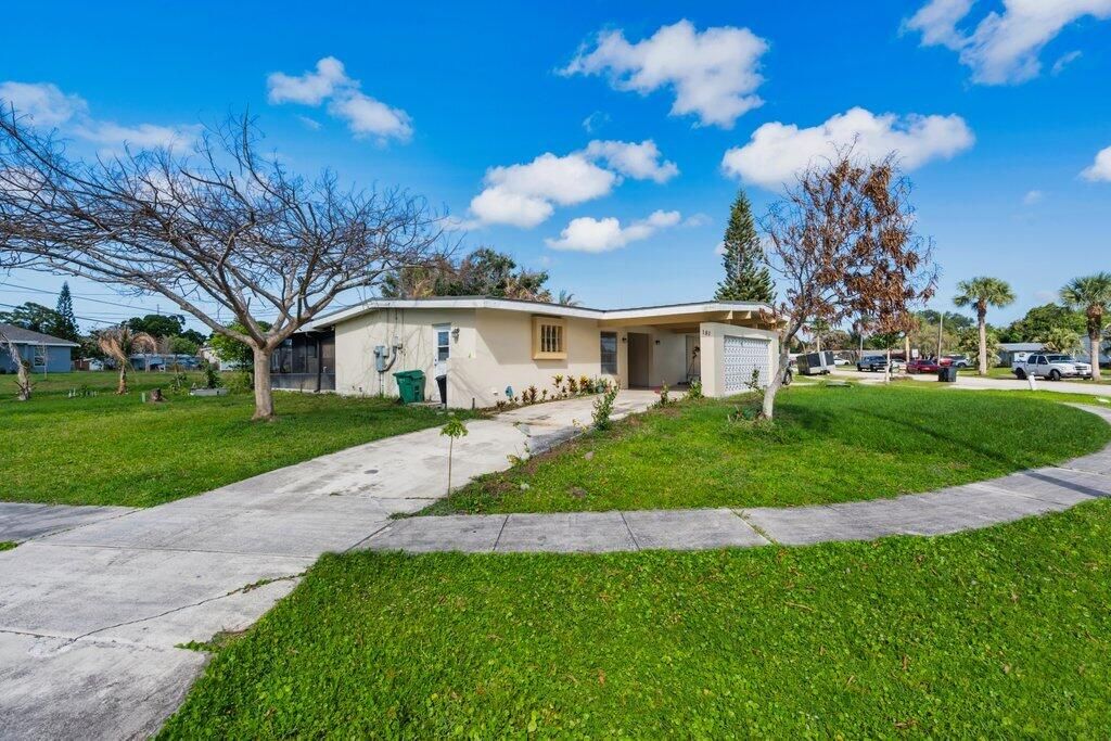 Photo of 181 Banyan Drive, Port Saint Lucie, FL 34952 (MLS # B26022056)