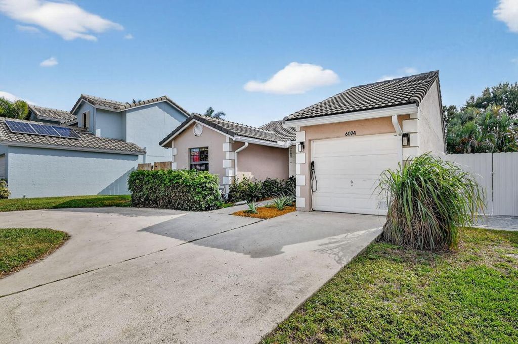 Photo of 6024 Strawberry Lakes Circle, Lake Worth, FL 33463 (MLS # R11152217)