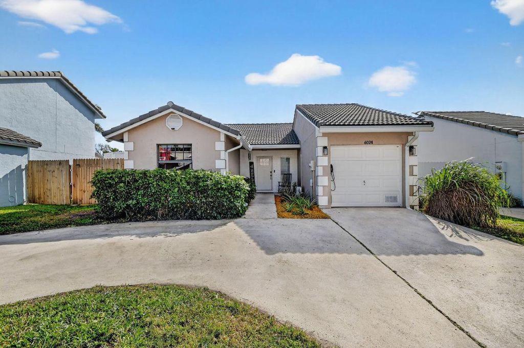 Photo of 6024 Strawberry Lakes Circle, Lake Worth, FL 33463 (MLS # R11152217)