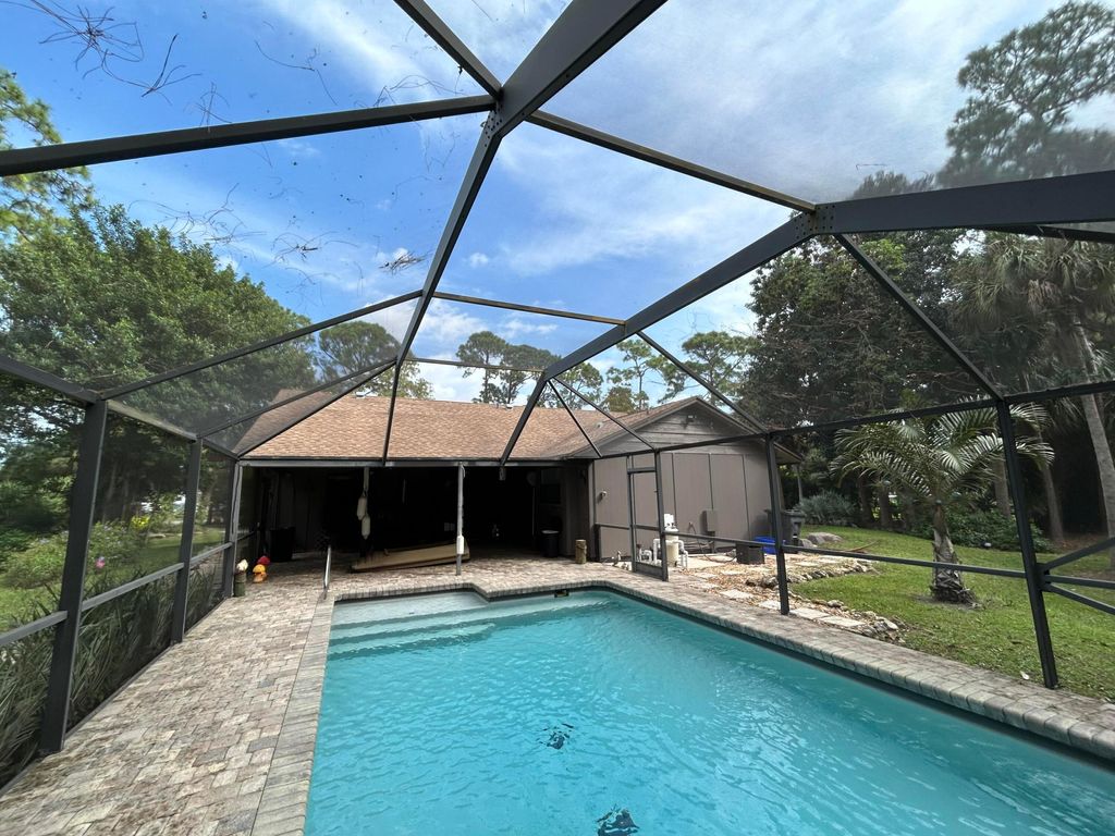 Photo of 9434 Palomino Drive, Lake Worth, FL 33467 (MLS # B26029570)